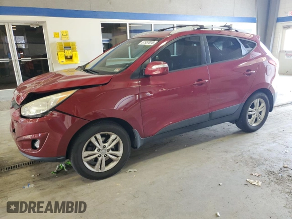 2013 Hyundai Tucson GLS with VIN KM8JU3AC7DU614962, listed as a Copart auction lot 51957675 with 112,942 mi miles and Salvage Title. Bid and sale history available at carsss.com. Image 1.