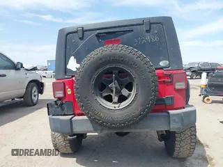 2015 Jeep Wrangler Unlimited Willys Wheeler with VIN 1C4BJWDG9FL750505, listed as a IAAI auction lot 41781762 with 139,000 mi miles and . Bid and sale history available at DreamBid. Image 17.