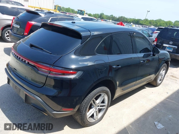 2022 Porsche Macan with VIN WP1AA2A51NLB05822, listed as a IAAI auction lot 39567077 with 54,527 mi miles. Bid and sale history available at carsss.com. Image 4.