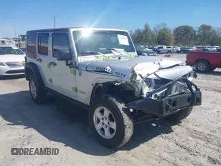2008 Jeep Wrangler Unlimited Rubicon z VIN 1J4GA691X8L555097, wystawiony jako IAAI lot #41889319 z przebiegiem 166 882 mil mil oraz . Historia ofert i sprzedaży dostępna na DreamBid. Obrazek 1.