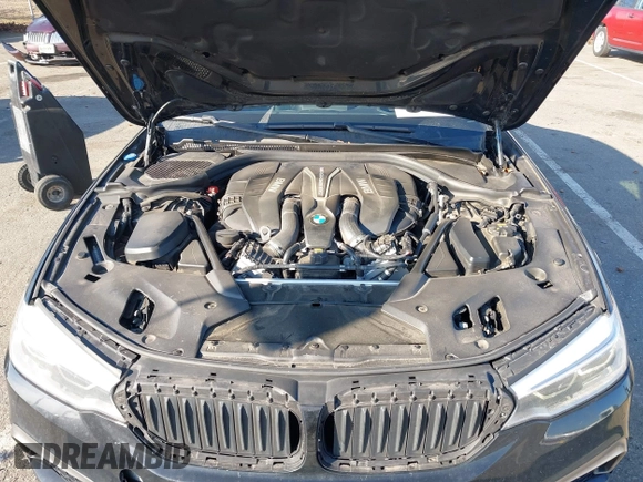 2018 BMW 5 Series M550i xDrive with VIN WBAJB9C55JB049529, listed as a IAAI auction lot 41241917 with 116,265 mi miles and . Bid and sale history available at carsss.com. Image 10.