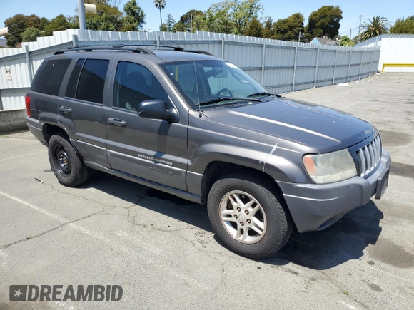 2004 Jeep Grand Cherokee Laredo with VIN 1J4GW48S54C430857, listed as a Copart auction lot 62744305 with 122,099 mi miles and Salvage title. Bid and sale history available at DreamBid. Image 4.