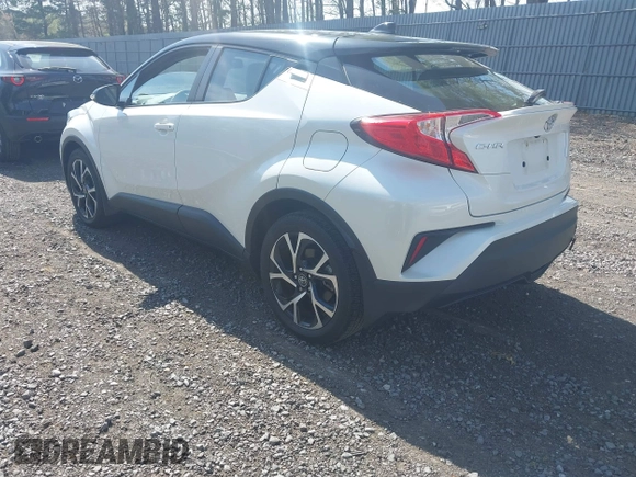 2019 Toyota C-HR XLE with VIN NMTKHMBX5KR097682, listed as a IAAI auction lot 42145372 with 11,003 mi miles and . Bid and sale history available at DreamBid. Image 3.