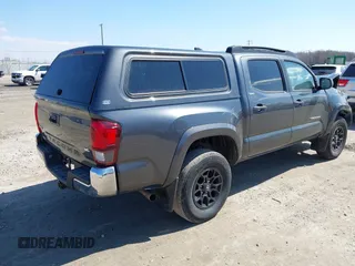 2021 Toyota Tacoma 4WD SR with VIN 3TMCZ5AN7MM442237, listed as a IAAI auction lot 41993450 with 30,148 mi miles. Bid and sale history available at carsss.com. Image 4.