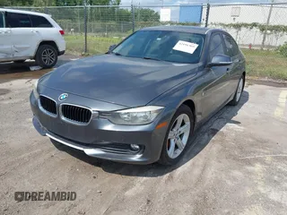 2013 BMW 3 Series 320i with VIN WBA3B1C5XDF462859, listed as a IAAI auction lot 42191369 with 140,253 mi miles and . Bid and sale history available at carsss.com. Image 2.