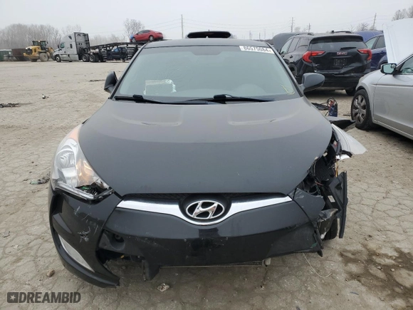 2017 Hyundai Veloster with VIN KMHTC6AD1HU311641, listed as a Copart auction lot 86575084 with 68,650 mi miles and Salvage Title. Bid and sale history available at carsss.com. Image 5.