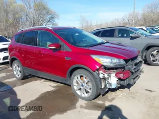 2014 Ford Escape Titanium with VIN 1FMCU9J97EUB79748, listed as a IAAI auction lot 41884915 with 197,899 mi miles. Bid and sale history available at carsss.com. Image 1.