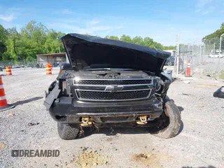 2013 Chevrolet Tahoe Commercial with VIN 1GNLC2E00DR265941, listed as a IAAI auction lot 42289977 with 206,840 mi miles and . Bid and sale history available at DreamBid. Image 11.