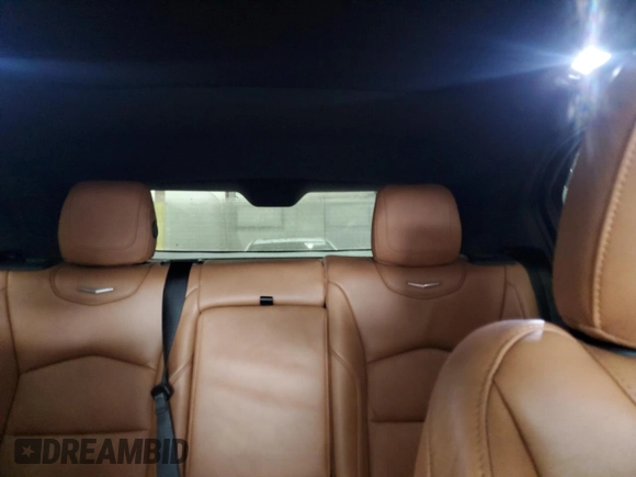 2020 Cadillac XT4 FWD Premium Luxury z VIN 1GYFZCR41LF143039, wystawiony jako Copart lot #57164005 z przebiegiem 24 218 mil mil oraz Nie do naprawy • Non repairable. Historia ofert i sprzedaży dostępna na DreamBid. Obrazek 10.