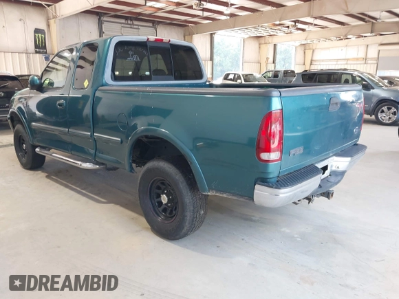 1998 Ford F-150 XL with VIN 1FTRX18L5WNB23716, listed as a IAAI auction lot 42579695 with 305,363 mi miles and . Bid and sale history available at DreamBid. Image 3.