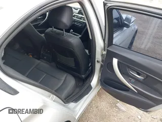 2014 BMW 3 Series 320i xDrive with VIN WBA3C3C58EP661364, listed as a IAAI auction lot 41947049 with 211,982 mi miles and . Bid and sale history available at DreamBid. Image 8.