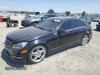 2014 Mercedes-Benz C 250 Sport with VIN WDDGF4HB9EA954117, listed as a Copart auction lot 59468405 with 132,028 mi miles and Salvage title. Bid and sale history available at DreamBid. Image 1.
