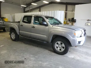 2015 Toyota Tacoma with VIN 3TMLU4EN7FM170049, listed as a Copart auction lot 52083725 with 162,062 mi miles and Salvage Title. Bid and sale history available at DreamBid. Image 4.