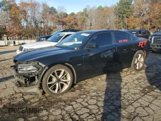 2015 Dodge Charger RT z VIN 2C3CDXCT8FH880101, wystawiony jako Copart lot #84232664 z przebiegiem 140 641 mil mil oraz Szkoda całkowita • Salvage title. Historia ofert i sprzedaży dostępna na DreamBid. Obrazek 1.