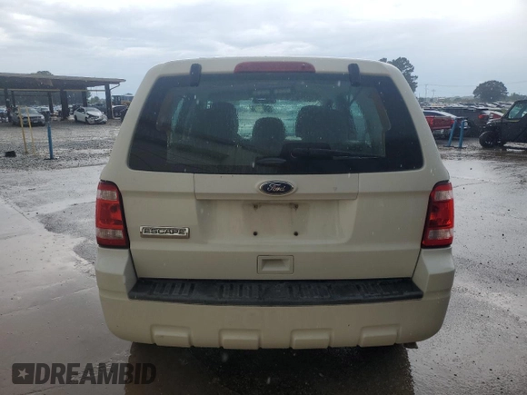 2011 Ford Escape XLS with VIN 1FMCU0C74BKC27897, listed as a Copart auction lot 63084415 with 116,423 mi miles and Clean title. Bid and sale history available at DreamBid. Image 6.