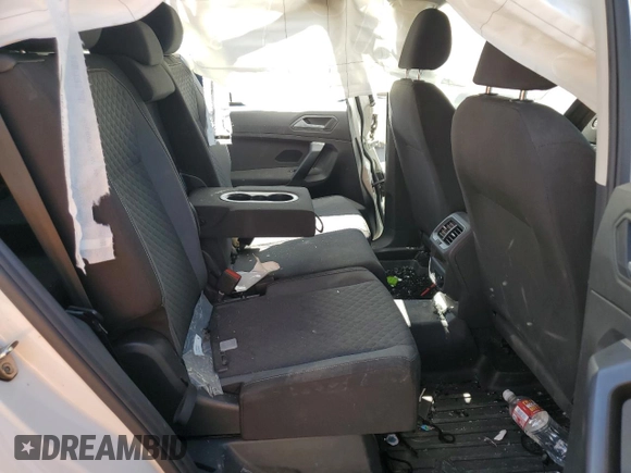 2021 Volkswagen Tiguan S z VIN 3VV1B7AX8MM065752, wystawiony jako Copart lot #62013905 z przebiegiem Nie podano mil oraz Szkoda całkowita • Salvage title. Historia ofert i sprzedaży dostępna na DreamBid. Obrazek 11.