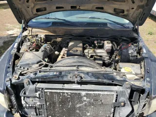 2004 Dodge 3500 ST z VIN 3D7MA48C44G273647, wystawiony jako Copart lot #58258565 z przebiegiem 305 070 mil mil oraz Tytuł czysty. Historia ofert i sprzedaży dostępna na DreamBid. Obrazek 11.