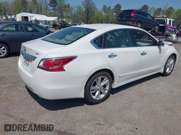 2015 Nissan Altima S with VIN 1N4AL3AP2FN399469, listed as a IAAI auction lot 42021456 with 33,885 mi miles and . Bid and sale history available at DreamBid. Image 4.