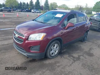 2016 Chevrolet Trax LT z VIN 3GNCJLSB3GL227097, wystawiony jako IAAI lot #42208844 z przebiegiem 118 887 mil mil oraz . Historia ofert i sprzedaży dostępna na DreamBid. Obrazek 2.