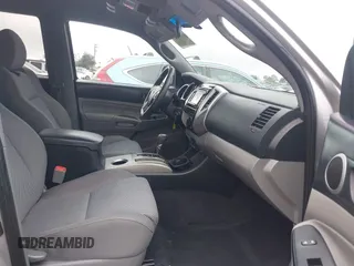 2014 Toyota Tacoma PreRunner with VIN 5TFJU4GN1EX052382, listed as a IAAI auction lot 41533721 with 165,245 mi miles. Bid and sale history available at carsss.com. Image 5.