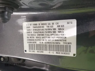 2013 Honda CR-V LX with VIN 3CZRM3H37DG708916, listed as a IAAI auction lot 42450090 with 118,002 mi miles and . Bid and sale history available at DreamBid. Image 9.