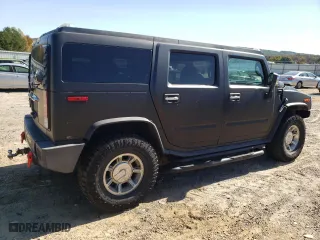 2005 Hummer H2 SUV with VIN 5GRGN23U65H108432, listed as a Copart auction lot 76786844 with 248,780 mi miles and Salvage Title. Bid and sale history available at carsss.com. Image 3.