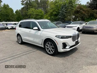 2019 BMW X7 xDrive50i z VIN 5UXCX4C55KLS38210, wystawiony jako Copart lot #59935315 z przebiegiem 126 853 mil mil oraz Czysty tytuł • Clean title. Historia ofert i sprzedaży dostępna na DreamBid. Obrazek 1.