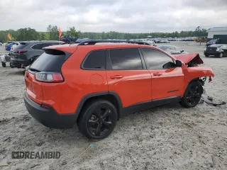 2021 Jeep Cherokee Altitude with VIN 1C4PJLLBXMD134300, listed as a Copart auction lot 54477235 with 153,002 mi miles and Salvage title. Bid and sale history available at DreamBid. Image 3.