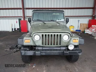 2005 Jeep Wrangler X z VIN 1J4FA39S75P310037, wystawiony jako IAAI lot #42186114 z przebiegiem 154 462 mil mil oraz . Historia ofert i sprzedaży dostępna na DreamBid. Obrazek 12.