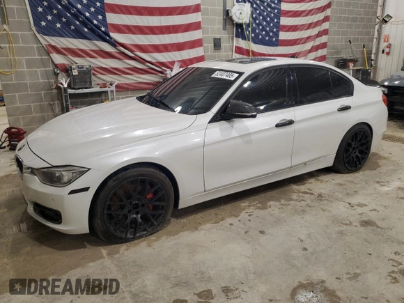 2013 BMW 3 Series 335i with VIN WBA3A9G51DNP36712, listed as a Copart auction lot 52407465 with 117,972 mi miles and Salvage title. Bid and sale history available at DreamBid. Image 1.