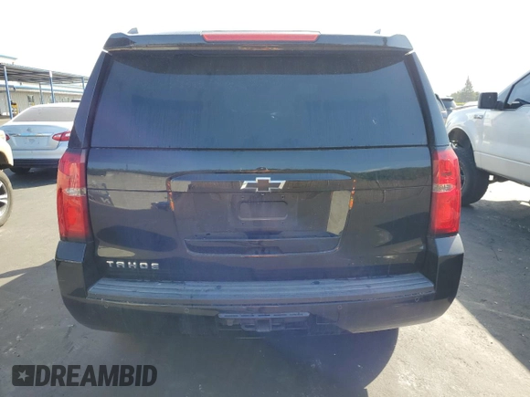 2015 Chevrolet Tahoe LT with VIN 1GNSCBKC0FR727525, listed as a Copart auction lot 53171665 with 114,689 mi miles and Salvage title. Bid and sale history available at DreamBid. Image 6.