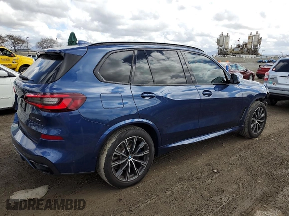 2021 BMW X5 xDrive45e with VIN 5UXTA6C09M9H50122, listed as a Copart auction lot 48162735 with 59,697 mi miles and Salvage Title. Bid and sale history available at carsss.com. Image 3.