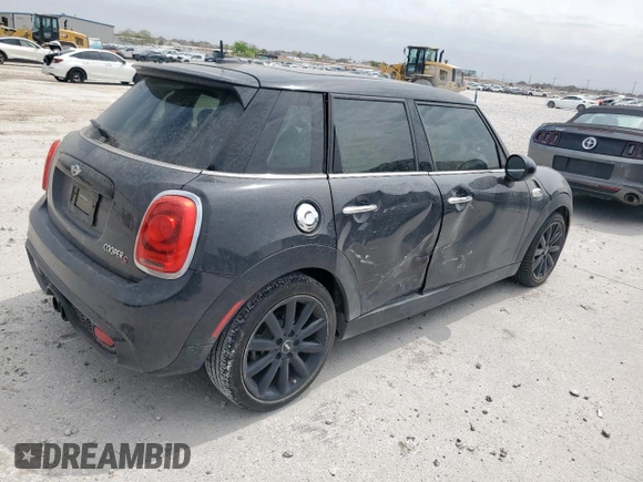 2016 MINI Hardtop 4 Door S with VIN WMWXU3C52G2D30894, listed as a Copart auction lot 50871865 with Not provided miles and Salvage title. Bid and sale history available at DreamBid. Image 3.