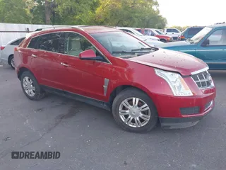 2011 Cadillac SRX Luxury Collection z VIN 3GYFNAEY2BS517192, wystawiony jako IAAI lot #42494074 z przebiegiem 191 094 mil mil oraz . Historia ofert i sprzedaży dostępna na DreamBid. Obrazek 1.