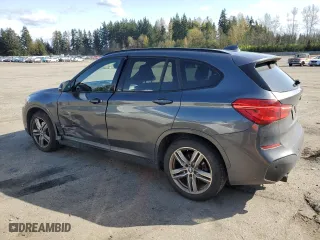 2016 BMW X1 xDrive28i with VIN WBXHT3C36G5E48019, listed as a Copart auction lot 51843235 with 95,711 mi miles and Salvage Title. Bid and sale history available at carsss.com. Image 2.