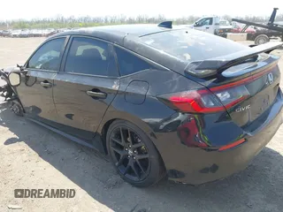 2023 Honda Civic Sport with VIN 19XFL2H86PE019273, listed as a IAAI auction lot 42066031 with 63,817 mi miles and . Bid and sale history available at DreamBid. Image 3.