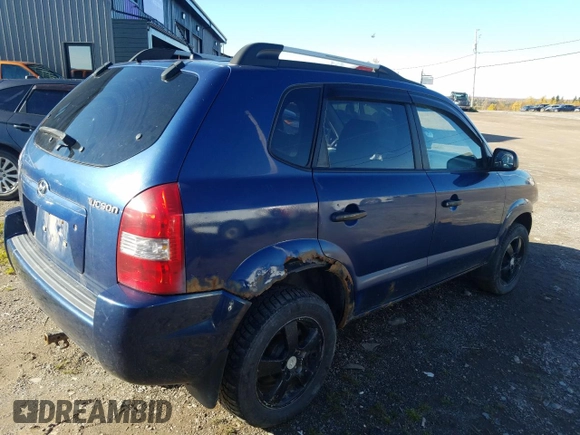 2006 Hyundai Tucson GL with VIN KM8JM72B76U405771, listed as a Copart auction lot 76751074 with 233,649 mi miles and Salvage Title. Bid and sale history available at carsss.com. Image 3.