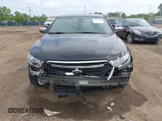 2019 Ford Taurus Limited z VIN 1FAHP2F82KG111088, wystawiony jako IAAI lot #42280384 z przebiegiem 97 961 mil mil oraz . Historia ofert i sprzedaży dostępna na DreamBid. Obrazek 13.