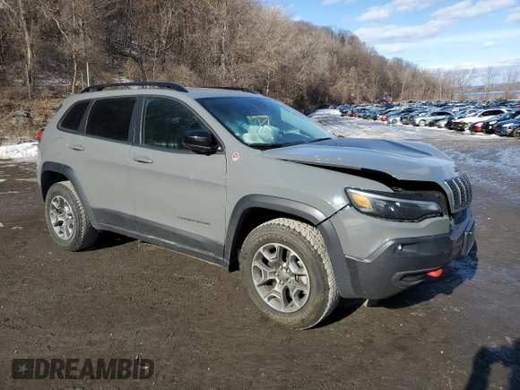 2022 Jeep Cherokee Trailhawk with VIN 1C4PJMBX4ND518870, listed as a Copart auction lot 44784025 with 17,701 mi miles and Salvage Title. Bid and sale history available at carsss.com. Image 4.