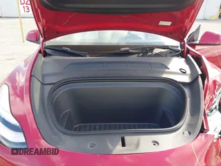 2023 Tesla Model Y Long Range with VIN 7SAYGDEE1PA154996, listed as a IAAI auction lot 41472595 with 24,861 mi miles and . Bid and sale history available at DreamBid. Image 10.