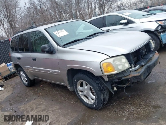 2005 GMC Envoy SLE with VIN 1GKDT13S552332088, listed as a IAAI auction lot 41699178 with 196,869 mi miles. Bid and sale history available at carsss.com. Image 1.