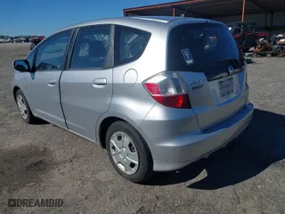 2013 Honda Fit with VIN JHMGE8H35DC073946, listed as a IAAI auction lot 41834130 with 173,018 mi miles. Bid and sale history available at carsss.com. Image 3.
