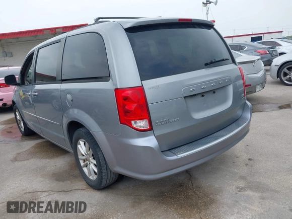 2014 Dodge Grand Caravan SXT z VIN 2C4RDGCG7ER212419, wystawiony jako IAAI lot #42272015 z przebiegiem 175 801 mil mil oraz . Historia ofert i sprzedaży dostępna na DreamBid. Obrazek 3.