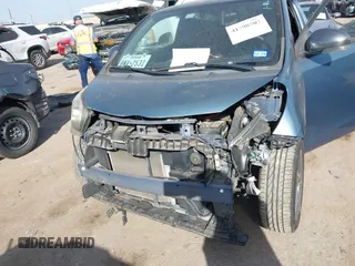 2012 Scion iQ with VIN JTNJJXB09CJ019082, listed as a IAAI auction lot 41798707 with 120,628 mi miles. Bid and sale history available at carsss.com. Image 6.