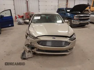 2018 Ford Fusion SE z VIN 3FA6P0HD2JR201693, wystawiony jako IAAI lot #42012709 z przebiegiem 110 857 mil mil oraz . Historia ofert i sprzedaży dostępna na DreamBid. Obrazek 6.