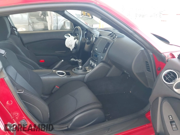 2016 Nissan 370Z with VIN JN1AZ4EH6GM931396, listed as a IAAI auction lot 42034122 with 16,477 mi miles. Bid and sale history available at carsss.com. Image 5.