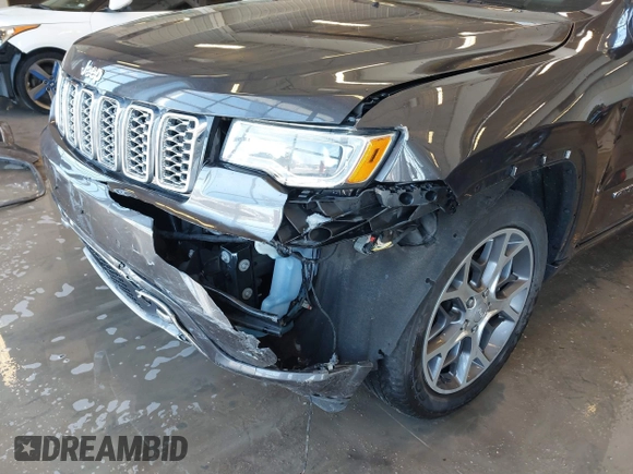 2020 Jeep Grand Cherokee Overland with VIN 1C4RJFCGXLC419668, listed as a IAAI auction lot 41608508 with 104,088 mi miles. Bid and sale history available at carsss.com. Image 6.