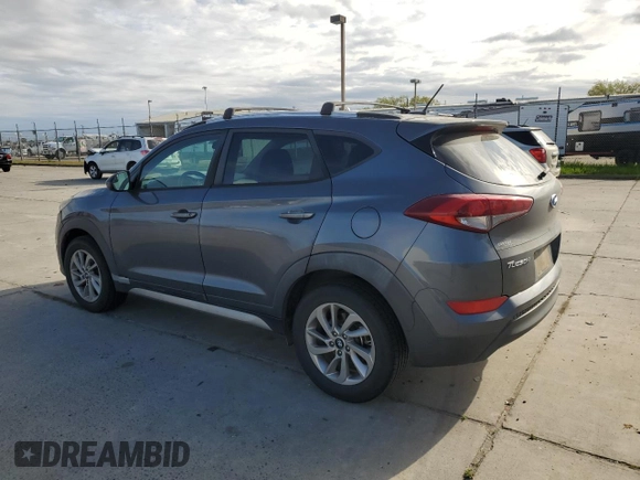 2017 Hyundai Tucson SE with VIN KM8J33A40HU330073, listed as a Copart auction lot 50713935 with 135,673 mi miles and Salvage Title. Bid and sale history available at DreamBid. Image 2.