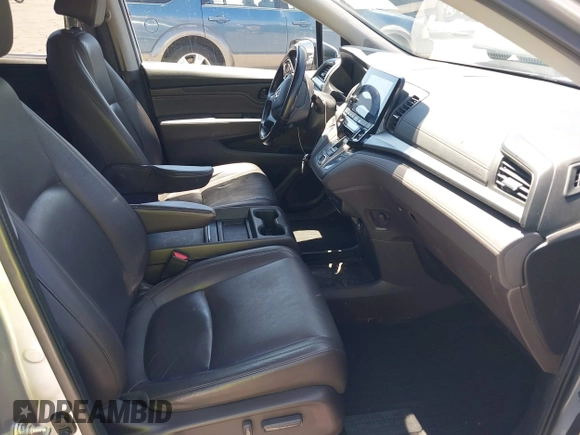 2018 Honda Odyssey Touring with VIN 5FNRL6H81JB022975, listed as a IAAI auction lot 42653304 with 210,137 mi miles and . Bid and sale history available at DreamBid. Image 5.