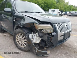 2009 Mercury Mariner Premier z VIN 4M2CU87759KJ17765, wystawiony jako IAAI lot #42354423 z przebiegiem 163 907 mil mil oraz . Historia ofert i sprzedaży dostępna na DreamBid. Obrazek 6.